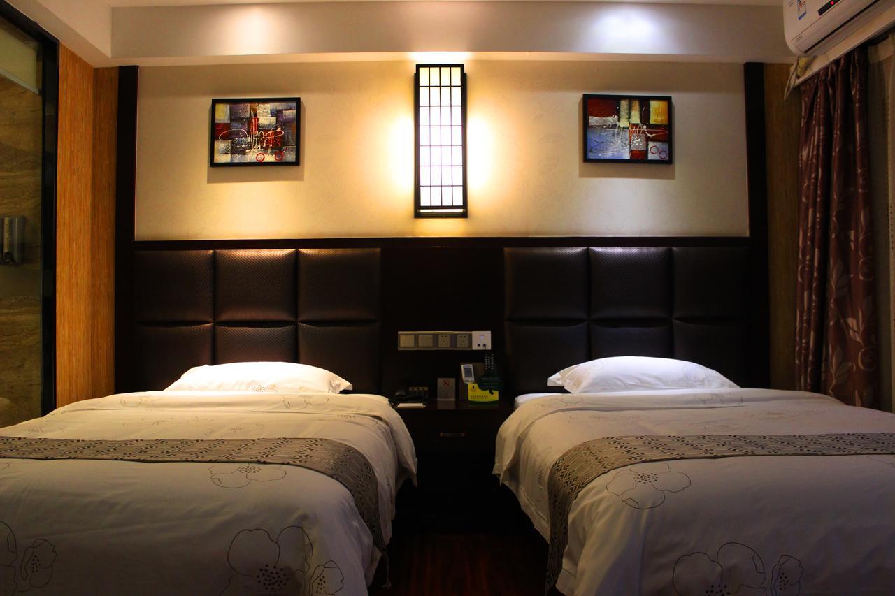 Guangzhou Wellgold Hotel Zimmer foto